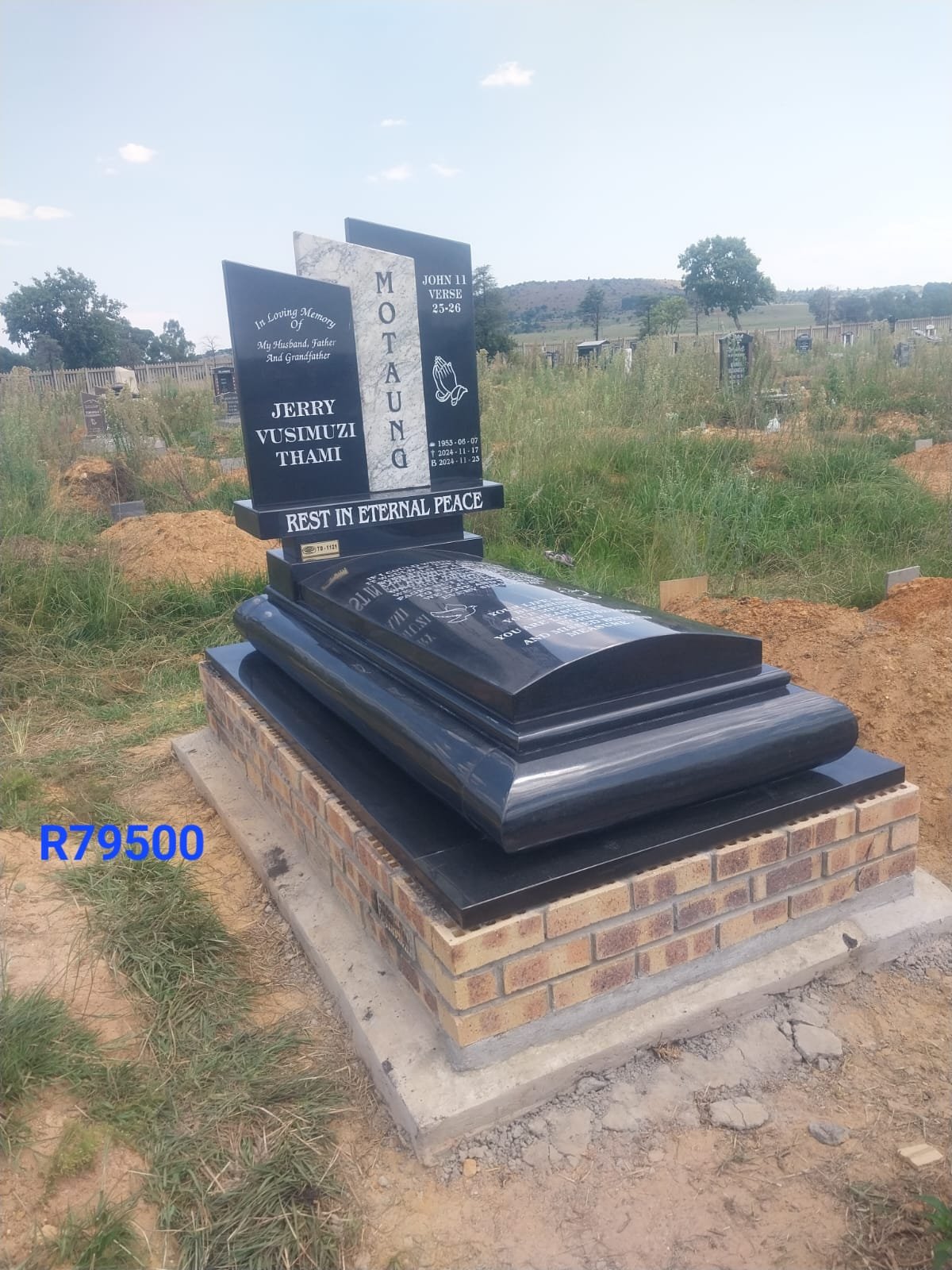 Memorial with gold lettering and photo