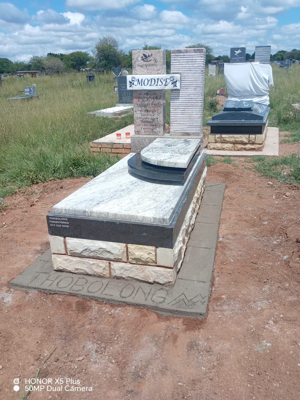 Unique white marble memorial with modern design