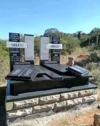 Sebati double tombstone with brick base and black granite