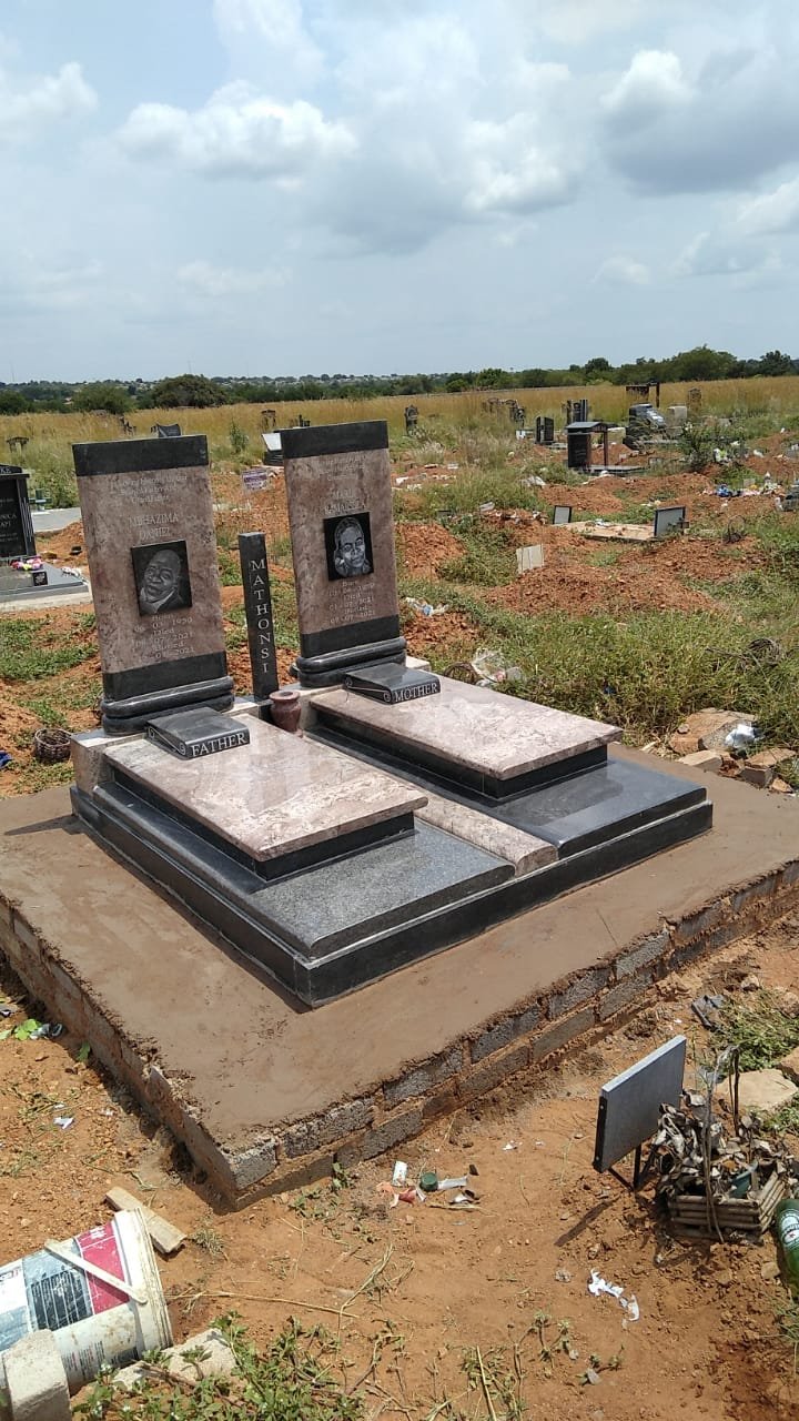 Mathonsi double tombstone with pink and black granite